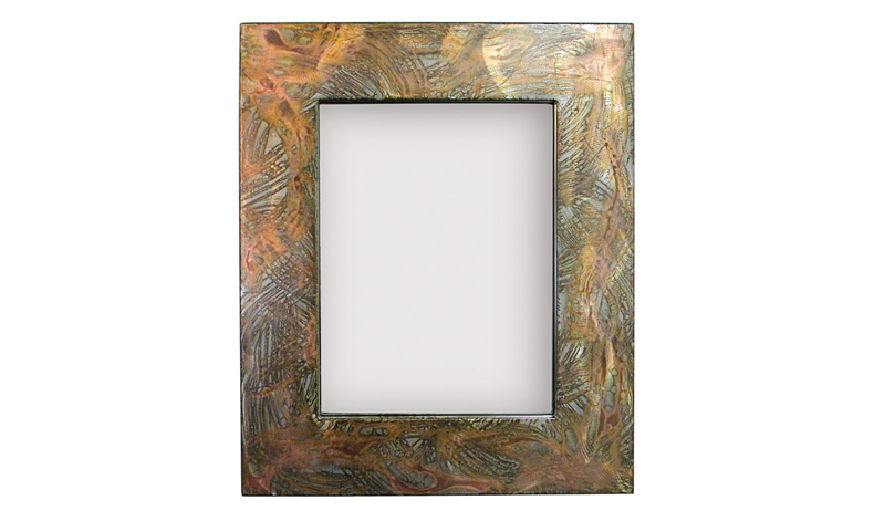Hand colored steel mirror with 4in mirror frame and hand stained black and copper patina finish.