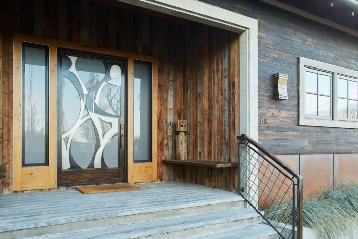 This siding is a combination of 16g steel panels, Shou Sugi Ban burned wood and our newest creation, "Crete Board."