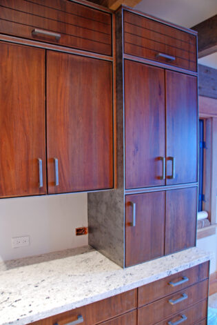 "Snake River" Kitchen on Mahogany framed with Brandner Design Etched Steel.