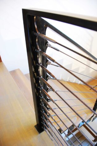 The Hunterdon Stair with floating steel stringer and Grey washed White Oak treads.