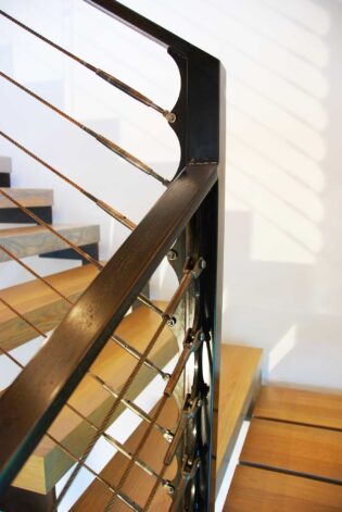 The Hunterdon Stair with floating steel stringer and Grey washed White Oak treads.