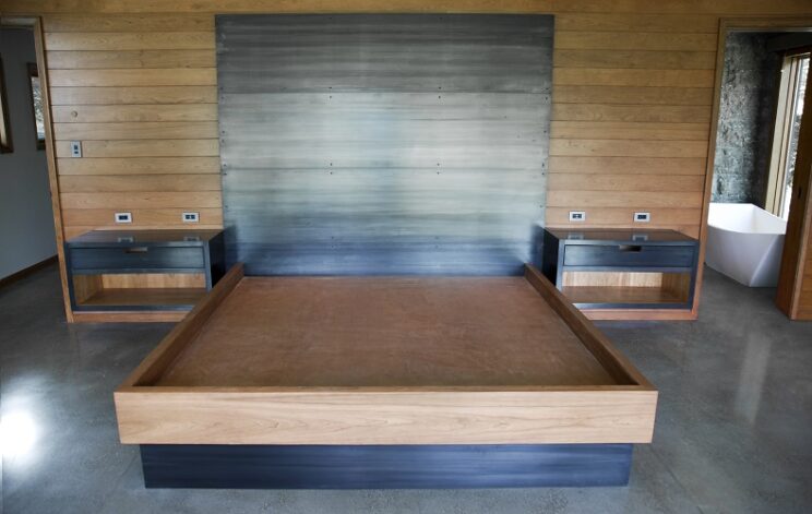Rockcress Bed with hanging side tables, Cherry wood, and blackened steel.