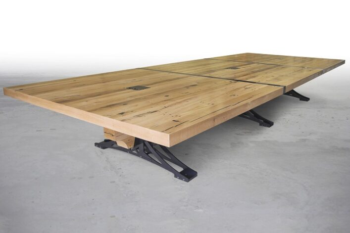 Van Zandt Conference Table built upon Brandner's trademark steel trusses and reclaimed White Oak milled from17th century barn beams.