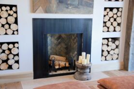 Brandner Design Shadow Mountain Fireplace Surround on Blackened steel.