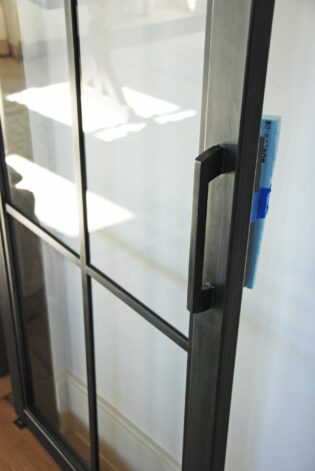 Shadow Mountain French Doors with Modern Square pulls hand-crafted from steel with blackened acid wash patina.