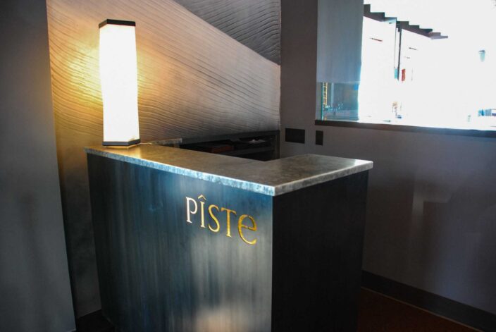 Countertops, bar, tables, and cabinets for commercial project Piste Restaurant in Jackson Hole.
