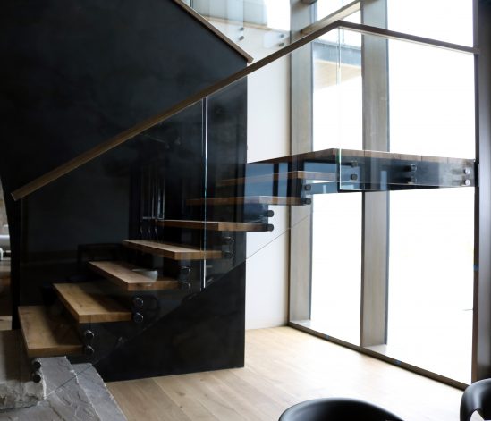 Brandner Design Steel Fin Stairs and Black Veil Steel Wall Panels