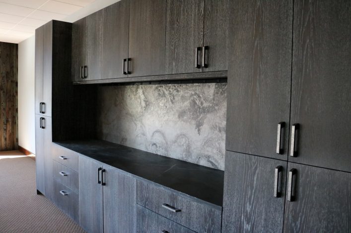 Brandner Design Midnight Oak Ceruse Cabinets with Etched Steel Back Splash.