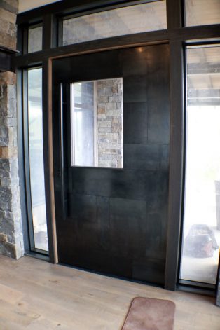 Lone Peak blackened steel mondrian modern entry door