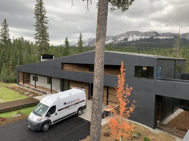 Stainless Steel Exterior Siding on sandblasted black and weathered black patinas at the Ross Peak Residency.