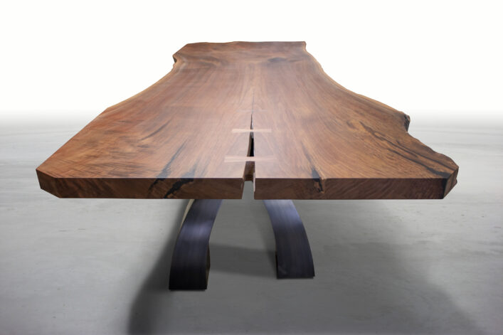 Big Walnut Wishbone Table on blackened steel