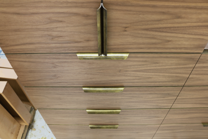 Walnut Manhattan Dresser with Brass Manhattan Pulls at the Ross Peak Residency.