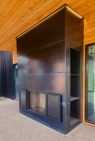 Sales Place Residence with custom made Fireplace on Blackened Hot Rolled Steel.