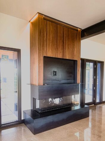 Sales Place Residence with custom made Fireplace on Blackened Hot Rolled Steel.