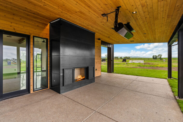 The Sales Place Residence with Hot Rolled Blackened Steel Overlapped Siding.